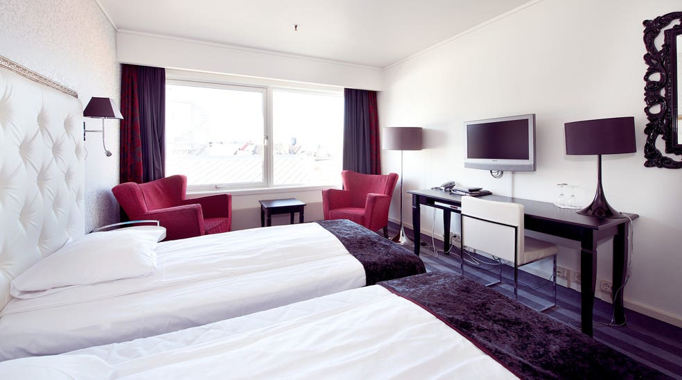 Well-furnished standard twin room with a desk and a view at Grand Olav Hotel in Trondheim
