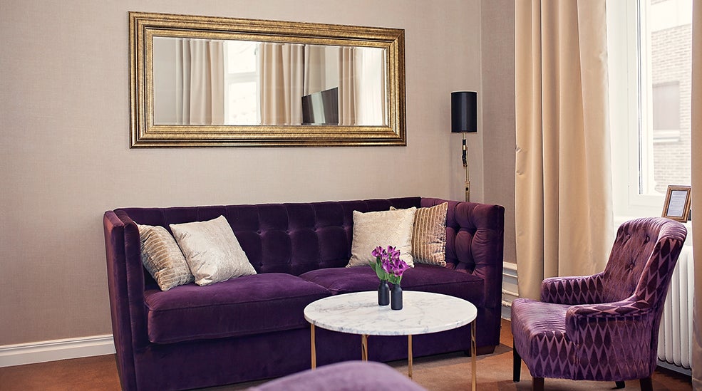 Suite with classy interior design including quality furniture at Grand Sundsvall Hotel in Sundsvall