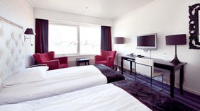 Well-furnished standard twin room with a desk and a view at Grand Olav Hotel in Trondheim
