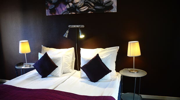Fashionable junior suite at Plaza Hotel in Karlstad