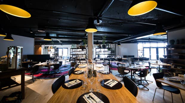 Elegant hotel restaurant area characterized by designer furniture at Energy Hotel in Stavanger