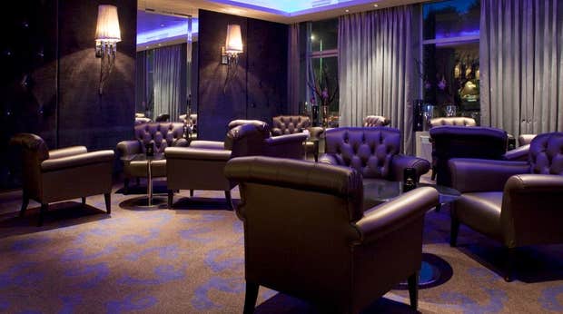 Lounge with comfortable quality leather chairs at Ernst Hotel in Kristiansand