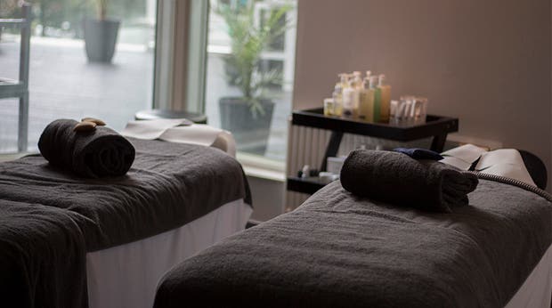 Treatment benches with towels at Elements Spa at Clarion Hotel Stockholm