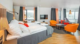 Extensive hotel suite with a great view of the fjord at The Edge Hotel in Tromso