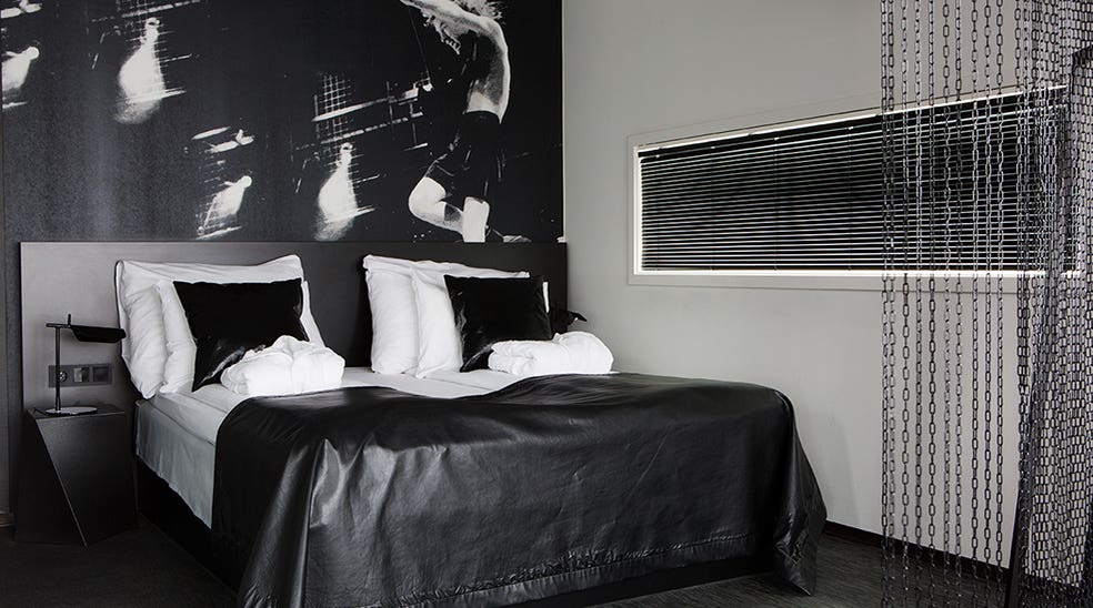 The AC/DC suite, double bed with leatherblanket at Comfort Hotel Union Brygge Drammen