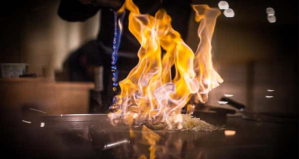 Food being flambéed at Yasuragi, Nordic Choice Hotels